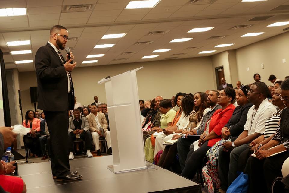 Dr. Paul Miller speaking to an audience